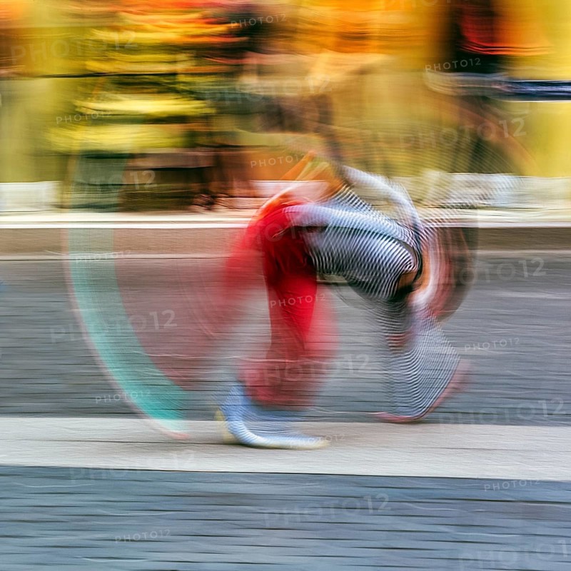 Colourful clown doing a cartwheel