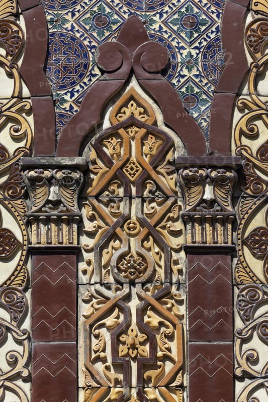 Ceramic tiles facade with faces
