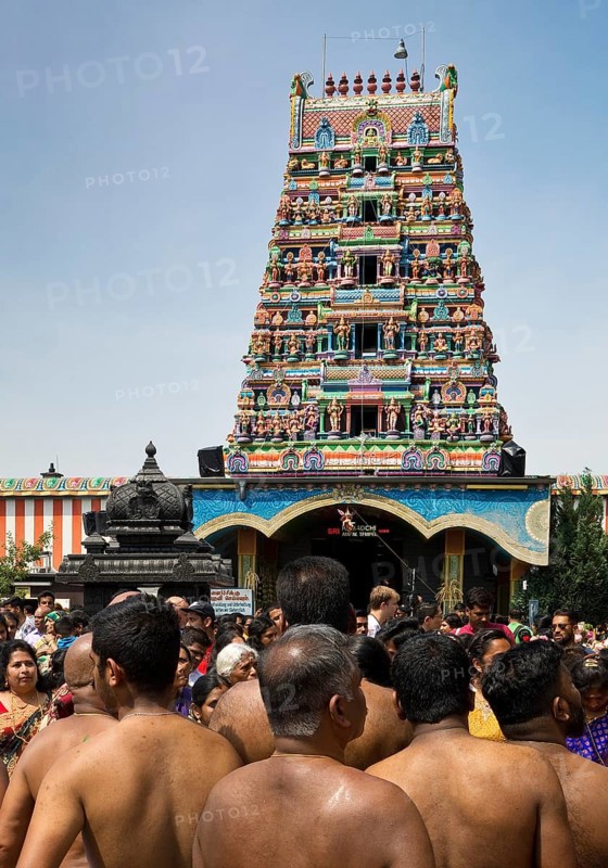 Hindus on the main festival day at the temple festival in front of the Hindu temple Sri Kamadchi Ampal