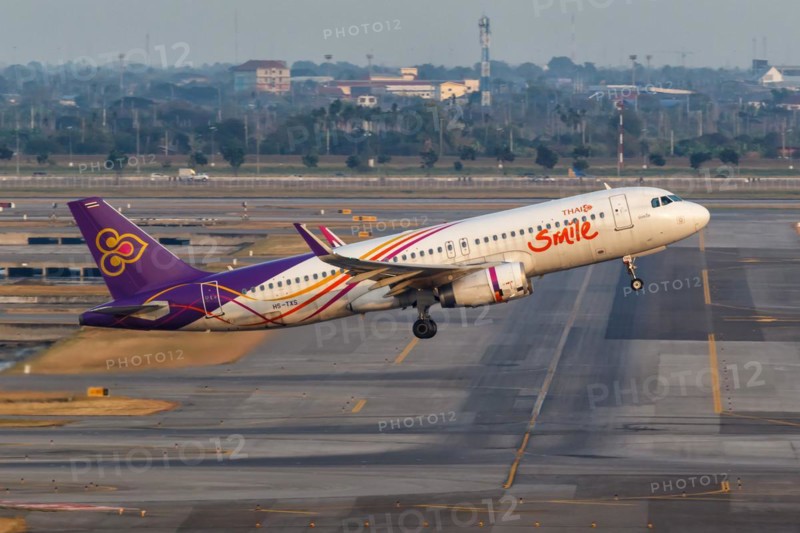 A Thai Smile Airbus A320 aircraft with registration HS-TXS at Bangkok Suvarnabhumi Airport