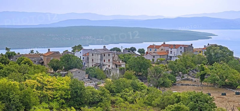View over old houses on the island Cres and Krk in the Kvarner Bay and the mainland