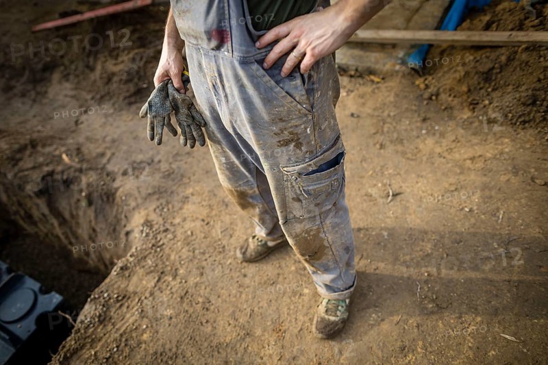 Dirty and tattered dungarees of a construction worker. Berlin