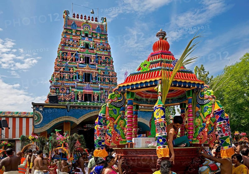 Hindus on the main festival day at the temple festival in front of the Hindu temple Sri Kamadchi Ampal
