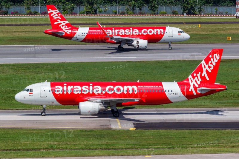 Airbus A320 aircraft of Indonesia AirAsia with registration PK-AZA at Changi Airport