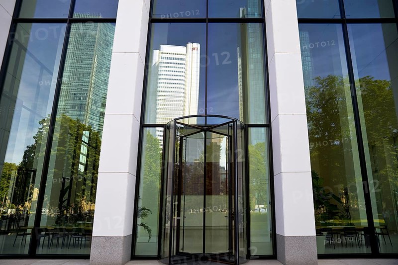 Reflection of the skyscrapers at the entrance to the Taunus Tower