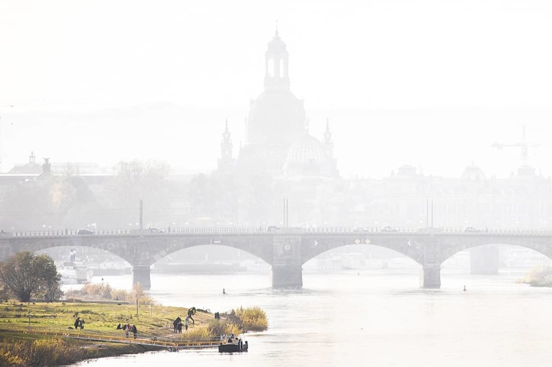People on the Elbe meadows against the backdrop of Dresden's old town