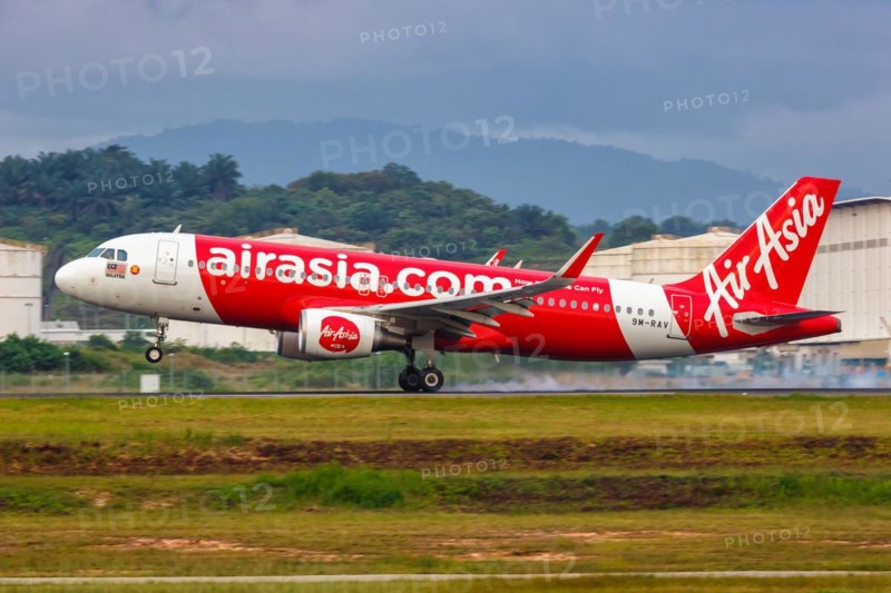 An AirAsia Airbus A320 aircraft with registration number 9M-RAV at Kuala Lumpur Airport
