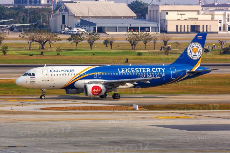 A Thai AirAsia Airbus A320 aircraft with registration HS-ABV and Leicester City Football Club special livery at Bangkok Don Mueang Airport