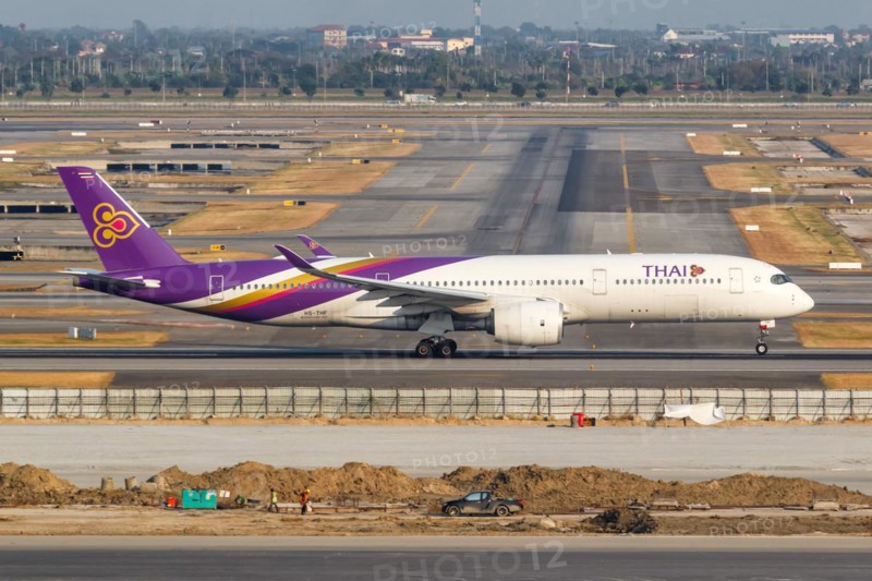 A Thai Airways Airbus A350-900 aircraft with registration HS-THF at Bangkok Suvarnabhumi Airport