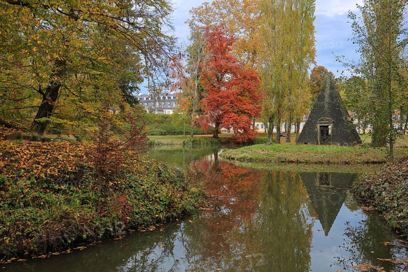 Pyramid at the pond during autumn with reflection