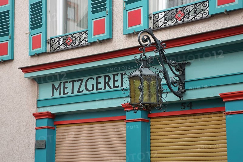Street lamp and inscription Metzgerei am Fachwerkhaus
