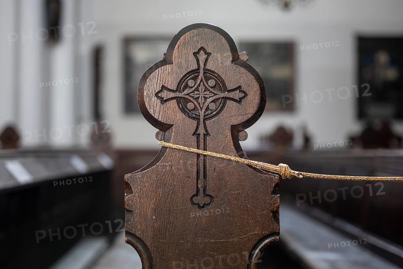 A bench in St. Mary's Church is locked down to maintain the minimum distance