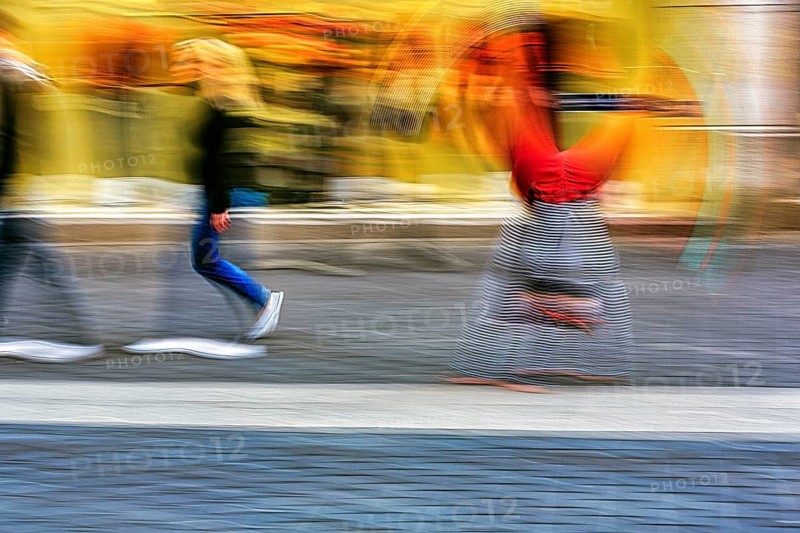 Colourful clown beats a wheel