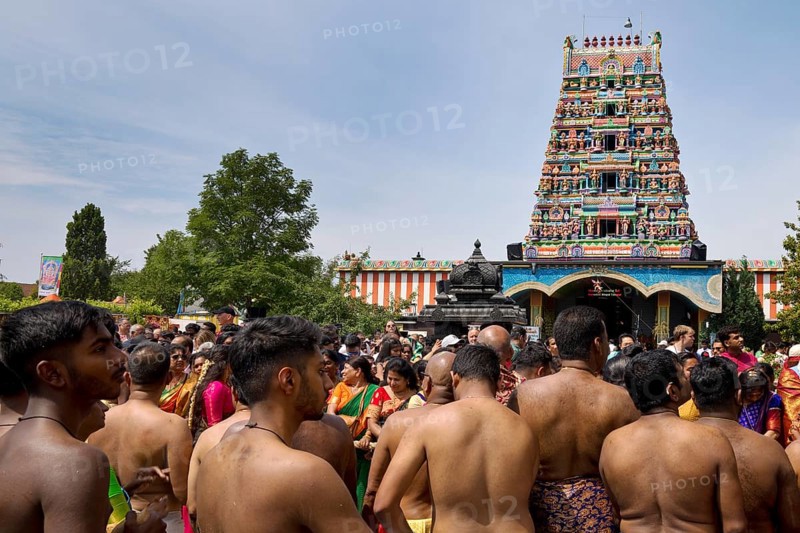 Hindus on the main festival day at the temple festival in front of the Hindu temple Sri Kamadchi Ampal