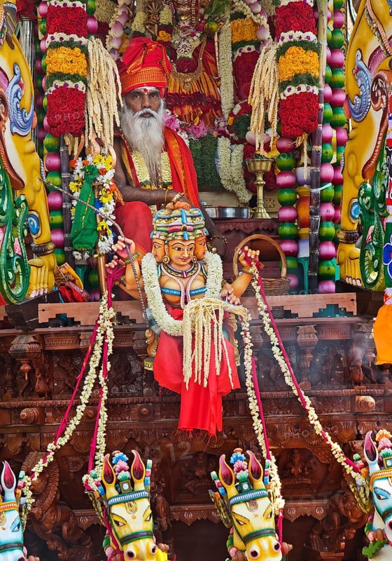 Priest Arumugam Paskaran at the main festival day during the big procession Theer