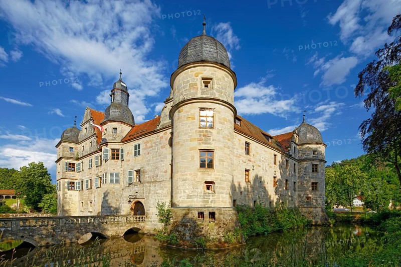 North-west side of Mitwitz moated castle with stone bridge and entrance portal