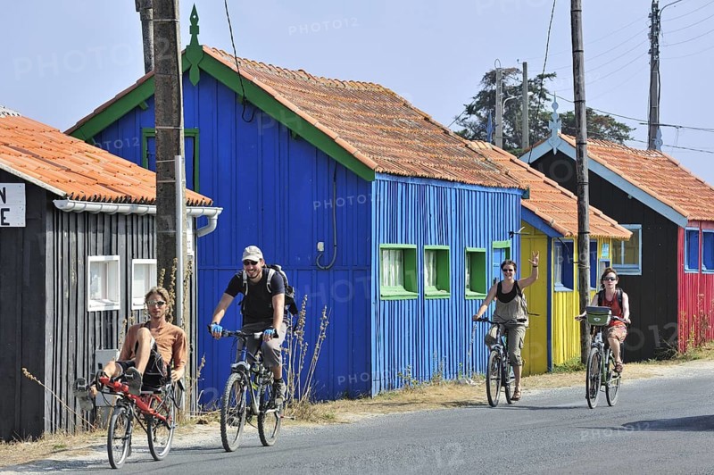 Colourful cabins of oyster farm at la Baudissiere near Dolus