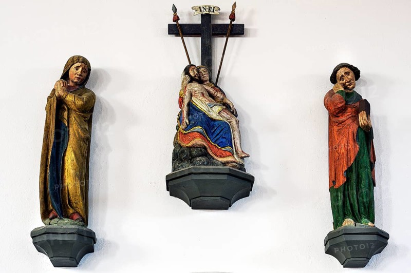 Pieta and two figures of saints
