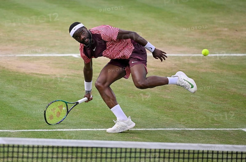 Frances Tiafoe USA converts his match point to win the title