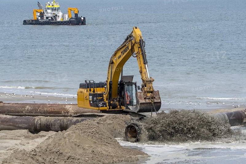 Crawler hydraulic excavator used for sand replenishment