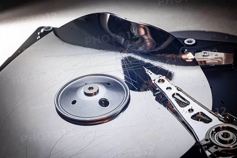 Detailed view of a destroyed computer hard disk. Berlin