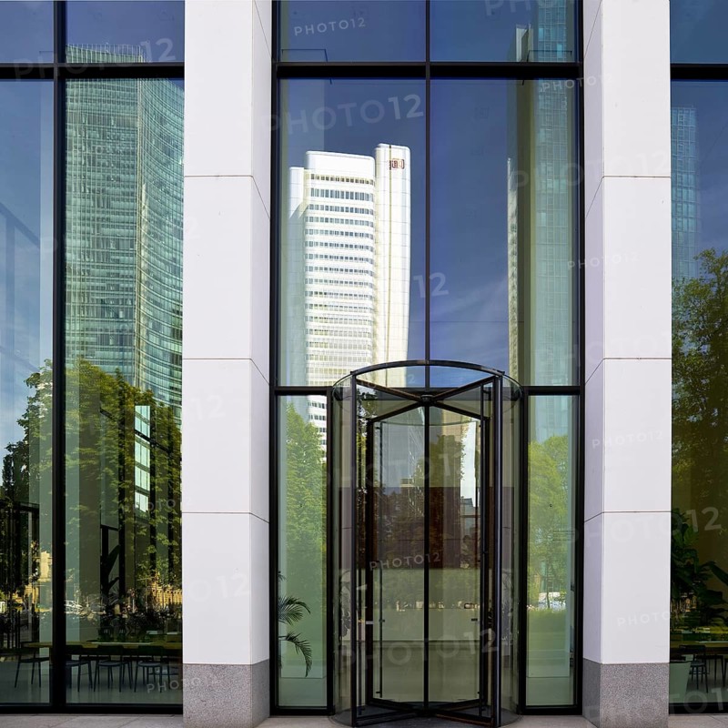 Reflection of the skyscrapers at the entrance to the Taunus Tower