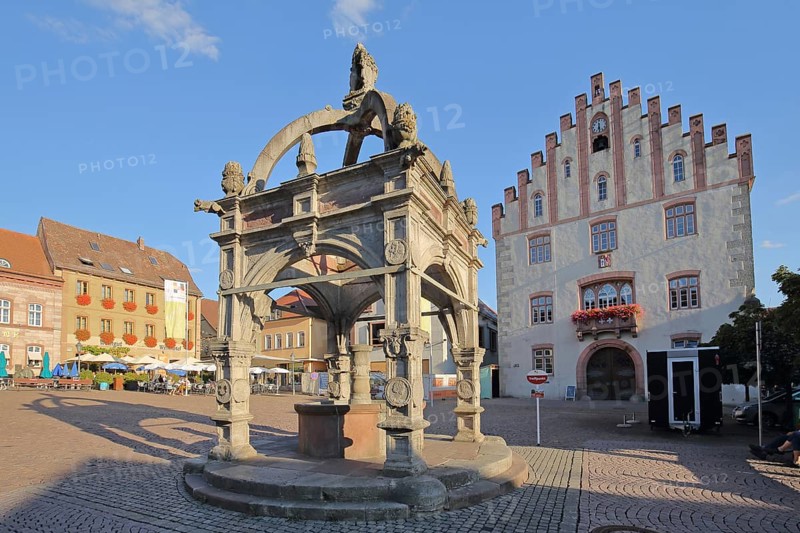 Renaissance market fountain and Gothic town hall built 1529
