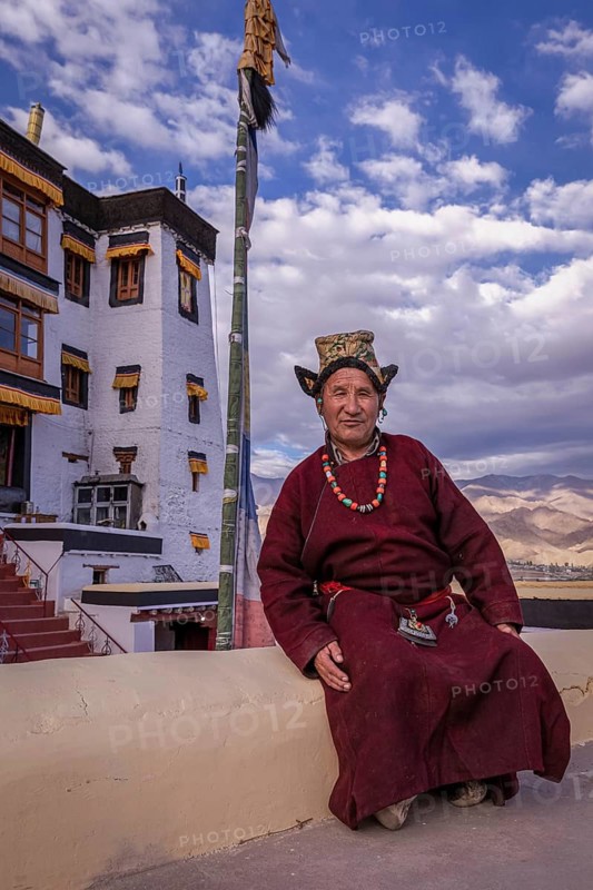 Elderly man in traditional Ladakhi clothes