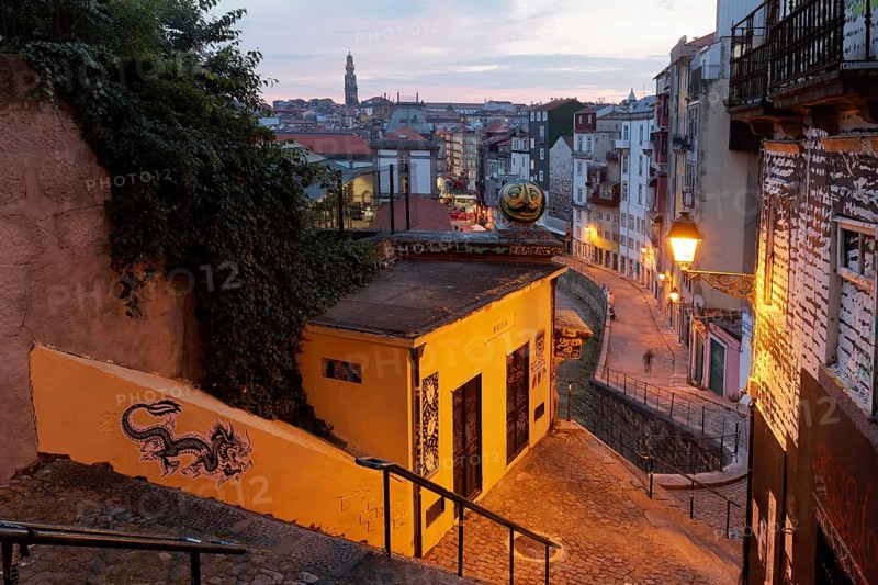 Steep staircase in the light of a alleyway lamp