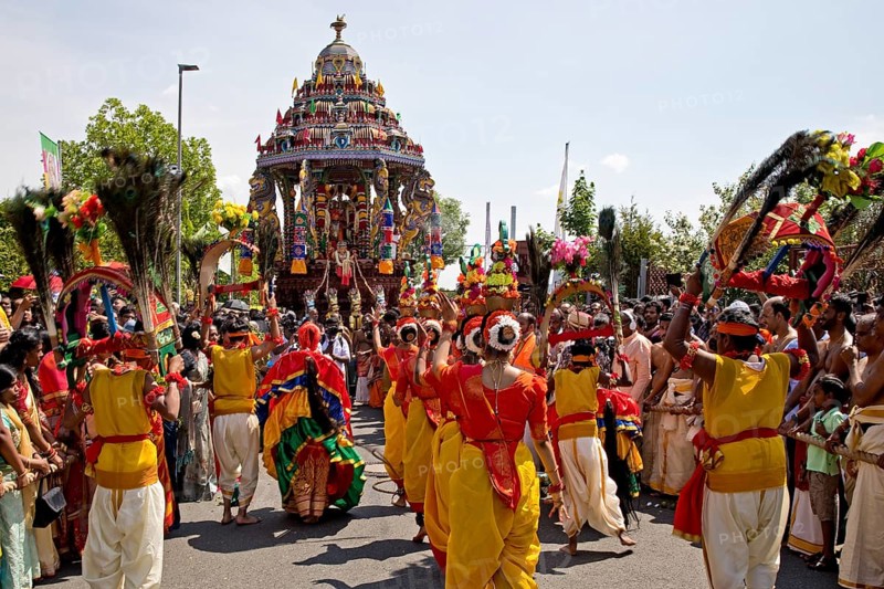 Dancing Hindus on the main festival day at the big parade Theer
