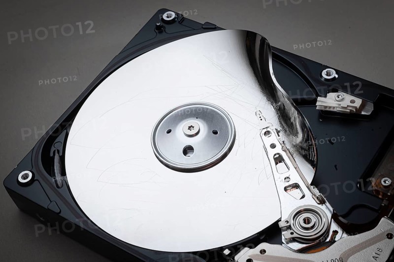 Detailed view of a destroyed computer hard disk. Berlin