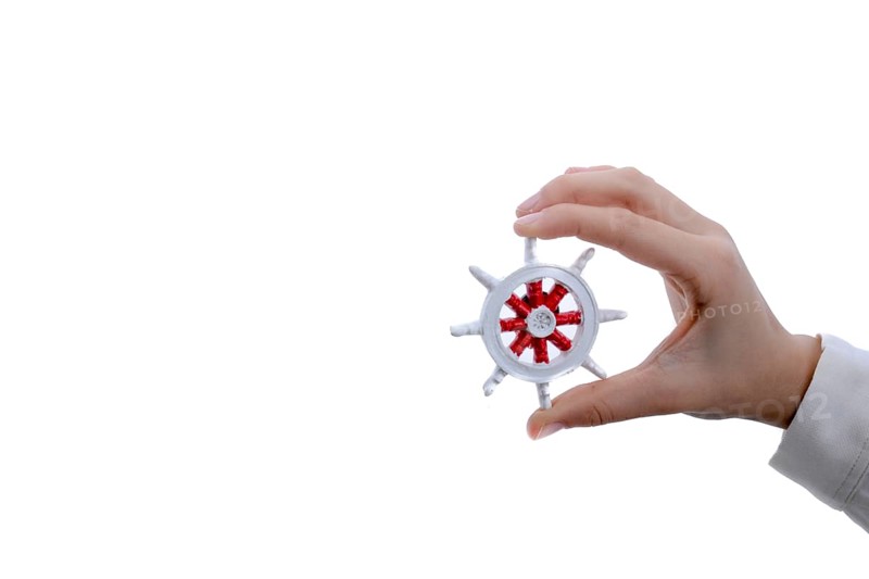 Isolated Ship steering wheel onhand