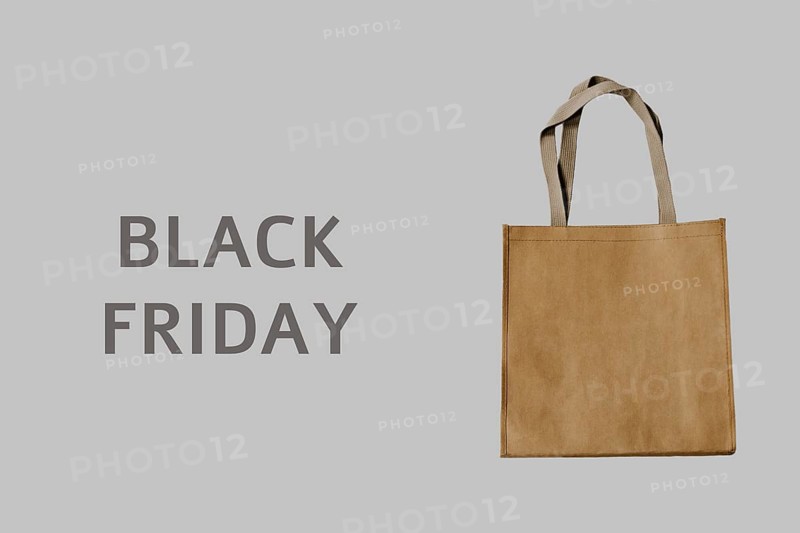 Black Friday. Luxury shopping bag on grey background. It can be use as a template