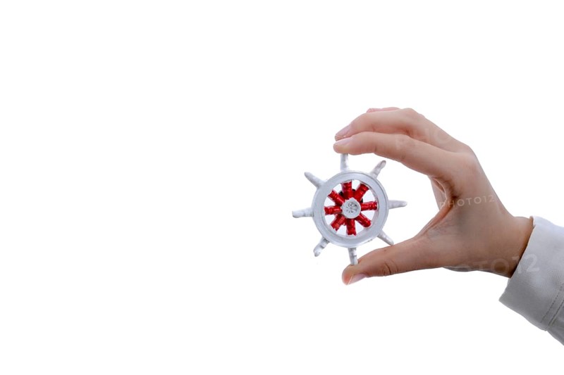 Isolated Ship steering wheel onhand