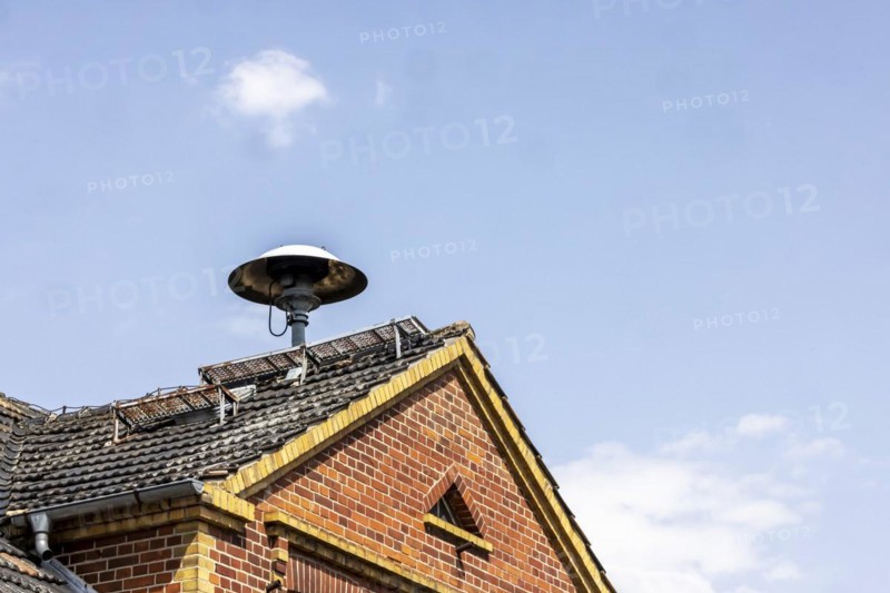 Siren on a roof