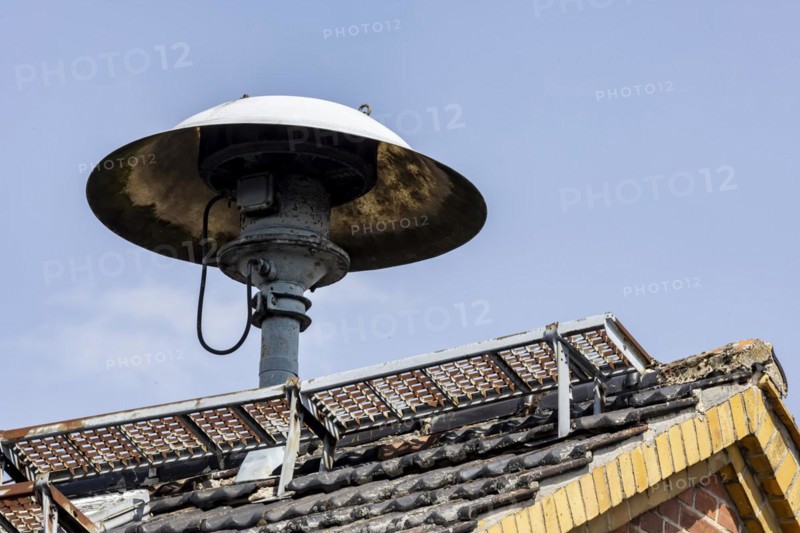Siren on a roof