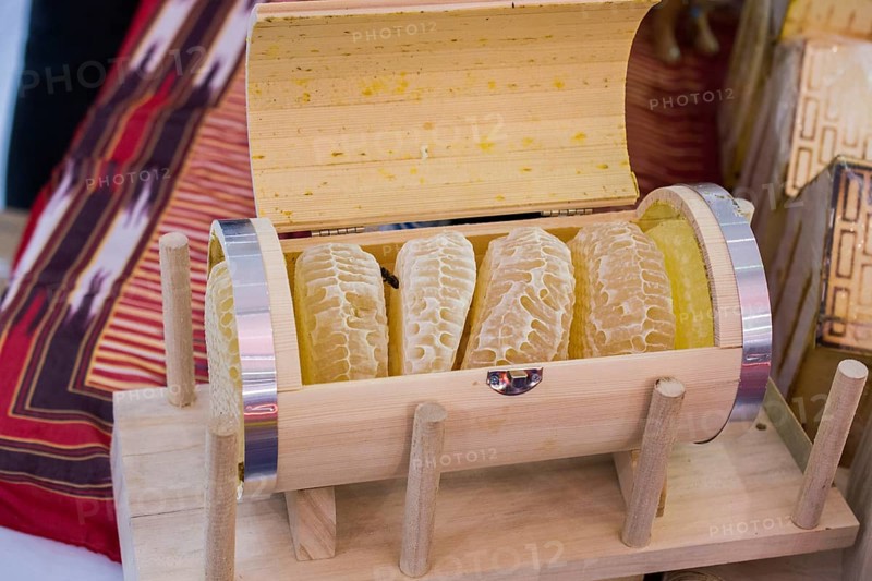 Sweet fresh honey in the sealed comb frame