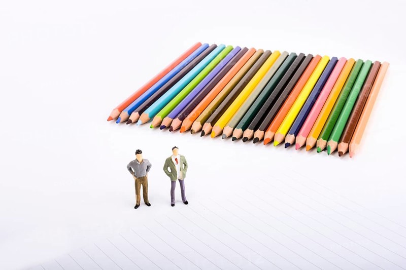 Two figurine standing by pen