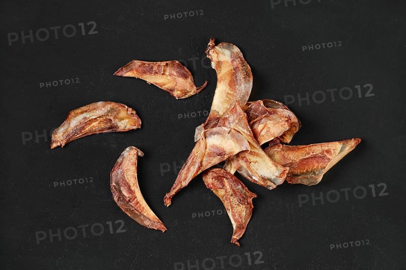 Top view of natural dried treats for dogs. Dried cartilage for dogs
