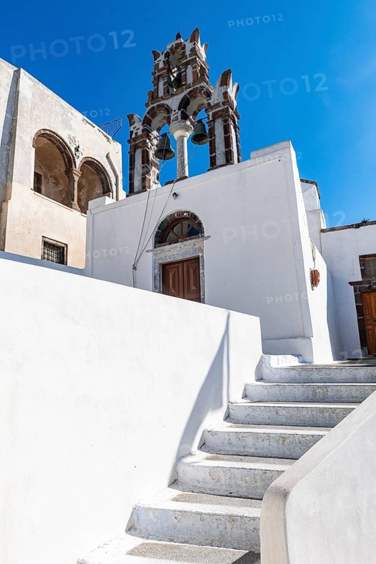 Belltower and Whitewashed architecture in Pyrgos