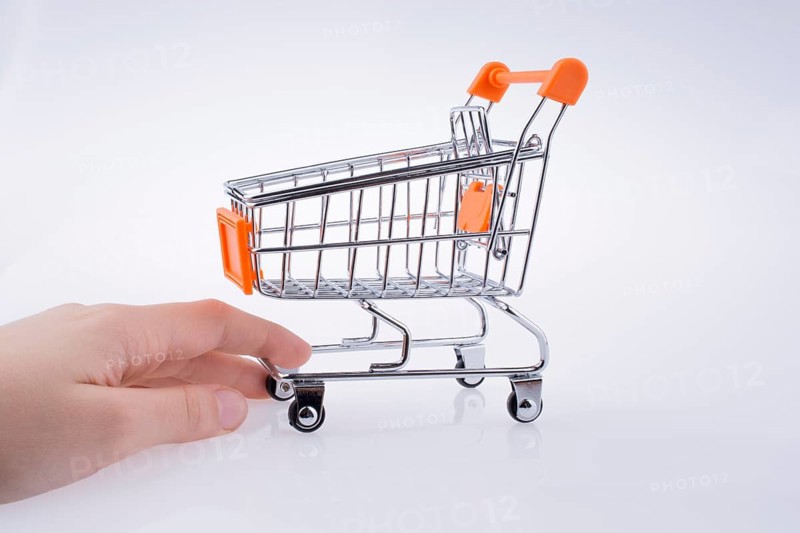 Hand holding a Cart on a white background