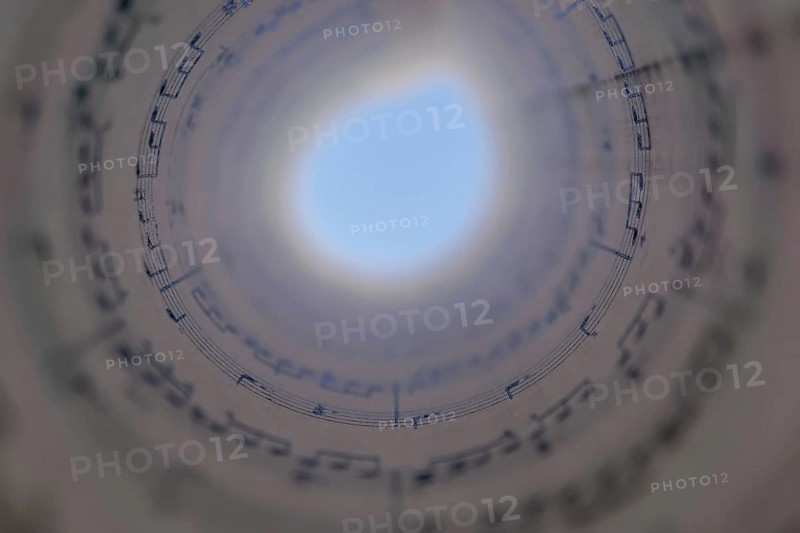 Spiral score forming a circle with a black background