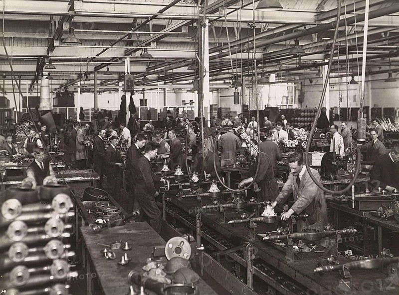 Wolseley factory interior with workers at machinery