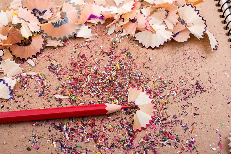 Red Color Pencil over some pencil shavings