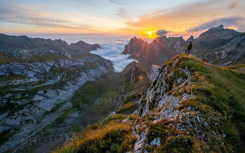 Mountaineer at sunrise at Rotsteinpass