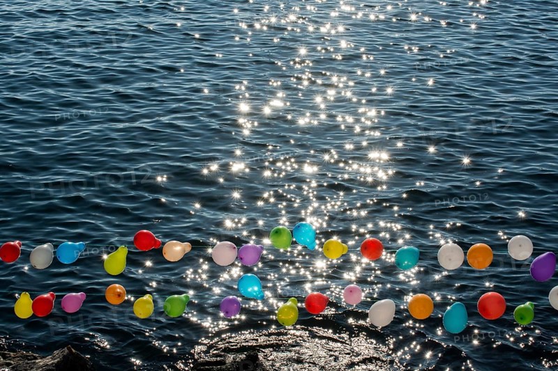 Balloon on a string on water for shooting game