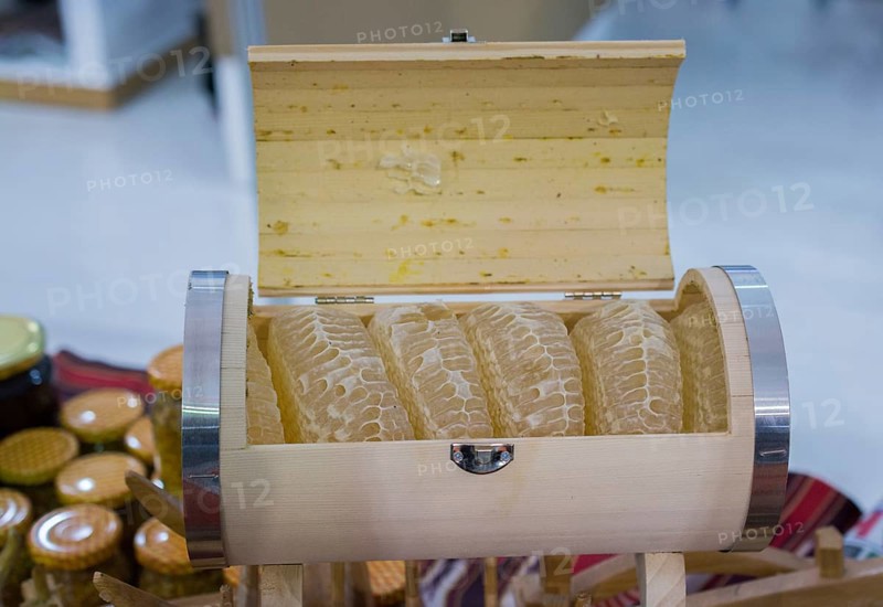 Sweet fresh honey in the sealed comb frame