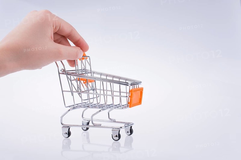 Hand holding a Cart on a white background