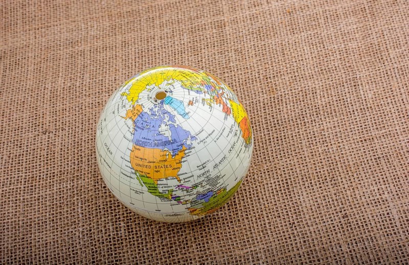Globe placed on a brown fabric background