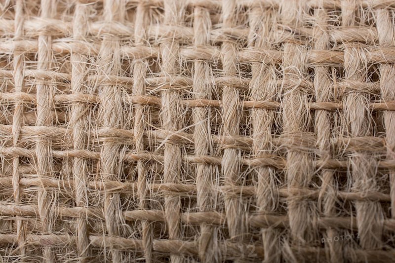 Brown color linen canvas as background texture